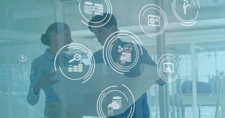 Image of financial data processing over diverse business people in office