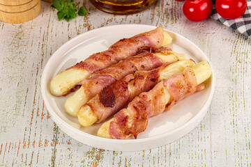 Hot mozzarella sticks with bacon