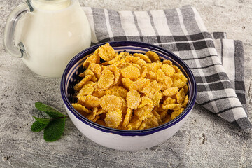Corn flakes with milk for breakfast