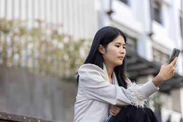 Future remote work combines technology smart phone connection online white digital business woman...