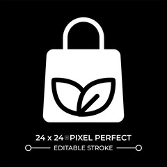 Eco bag glyph ui icon isolated on black. Tote shopper with leaves print. Environmental friendly fashion. Minimalist accessory. Vector solid symbol dark mode. User interface element, pixel perfect
