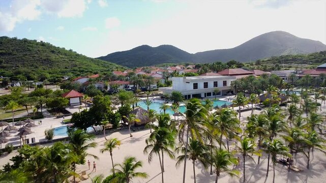 Tropical resort with pools, palm trees, and ocean views in Isla de Margarita, Venezuela