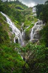 Heart-shaped waterfall in the rock mountain