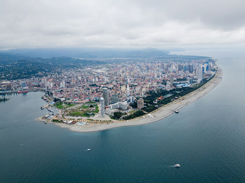 Aerial drone shot to View of Batumi. Adjara. Modern and historic buildings in the resort town. Georgia. 
