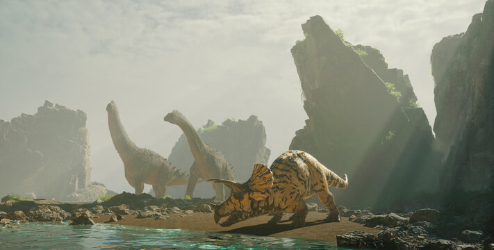 Dinosaurs gather near a tranquil water body amidst rocky terrain in a prehistoric landscape at dawn