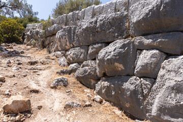 Supporting stone wall of ancient Roman Delikkemer aqueduct bridge