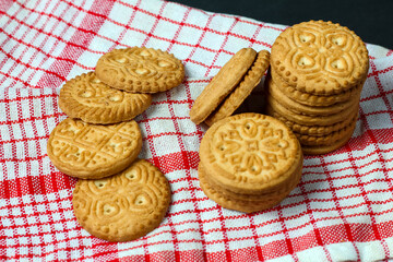 stack of biscuits on a checkered cloth