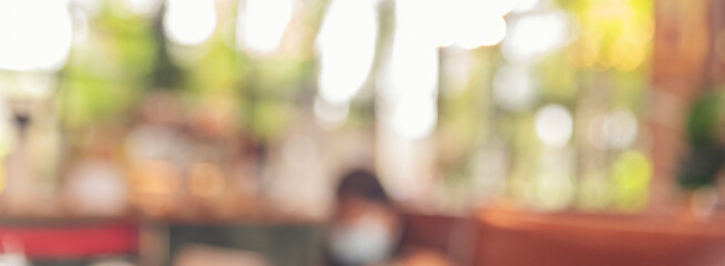 Banner Blurred background cafe coffee shop restaurant in shopping mall with light bokeh business event retail store. Banner blurry background interior design bar table chair windows with copy space