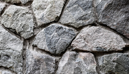 Abstract gray grunge background. Textured stone wall. Close-up.