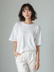 Fototapeta premium White Oversized Tshirt Front View Mockup on Asian Female Model