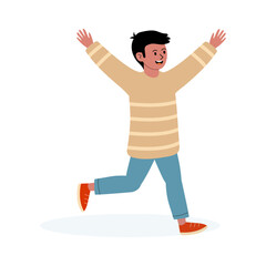 Young boy joyfully running with arms raised in expressive celebration