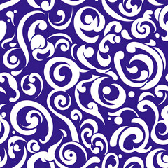 Swirling white floral designs flourish on a deep blue backdrop creating a vibrant & decorative pattern