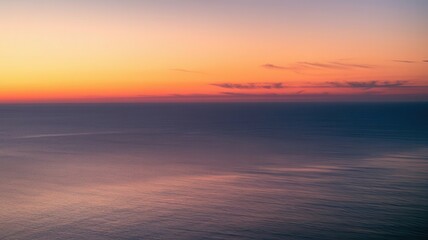 Beautiful sunset over the ocean with colorful sky and calm waters