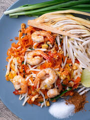 Pad Thai is a stir fry rice noodles with shrimp. Popular Thai street food.