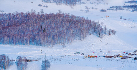 Hemu Village, Snowy Mountains, Forests, and Winter Snow Scenery in Xinjiang Uygur Autonomous Region, China On March 1st, 2023