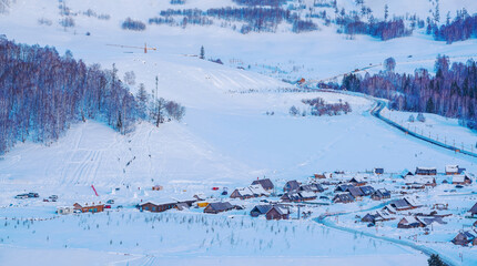 Hemu Village, Snowy Mountains, Forests, and Winter Snow Scenery in Xinjiang Uygur Autonomous Region, China On March 1st, 2023