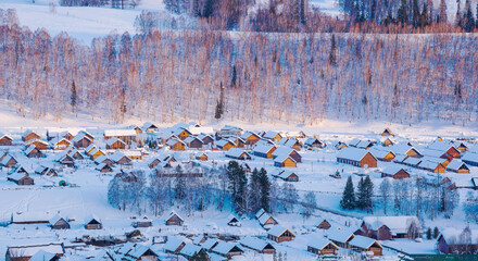 Hemu Village, Snowy Mountains, Forests, and Winter Snow Scenery in Xinjiang Uygur Autonomous Region, China On March 1st, 2023