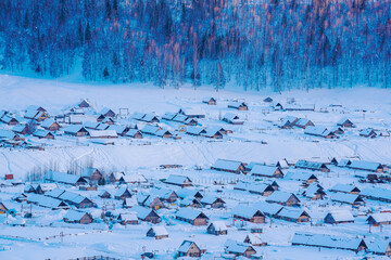 Hemu Village, Snowy Mountains, Forests, and Winter Snow Scenery in Xinjiang Uygur Autonomous Region, China On March 1st, 2023