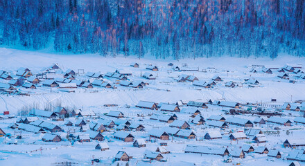 Hemu Village, Snowy Mountains, Forests, and Winter Snow Scenery in Xinjiang Uygur Autonomous Region, China On March 1st, 2023