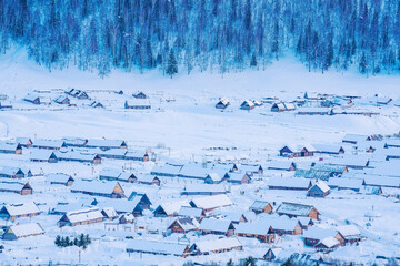 Hemu Village, Snowy Mountains, Forests, and Winter Snow Scenery in Xinjiang Uygur Autonomous Region, China On March 1st, 2023