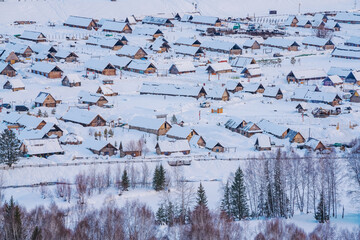 Hemu Village, Snowy Mountains, Forests, and Winter Snow Scenery in Xinjiang Uygur Autonomous Region, China On March 1st, 2023
