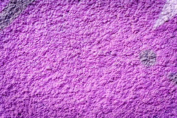 Abstract background with purple concrete wall texture.