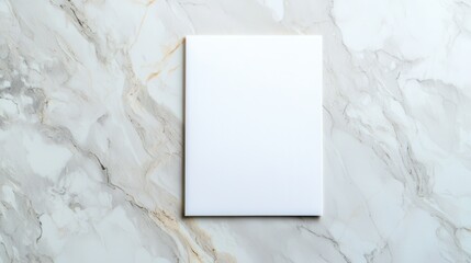 Blank white canvas on a marble textured background ideal for mockup or design presentation.