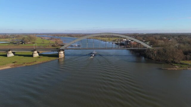 Aerial View of Train Crossing the Culemborg Railway Bridge Over the Lek River