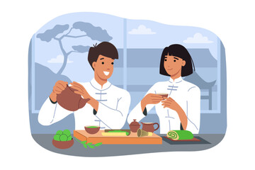Tea ceremony with man and woman drinking hot drink from clay pot, dressed in traditional asian clothing. Visitors to oriental restaurant enjoy tea ceremony and talk or taste desserts