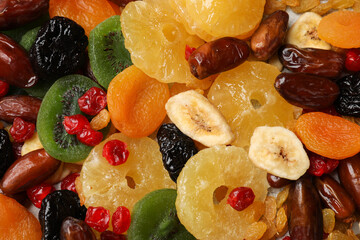 Mix of different dried fruits as background, top view