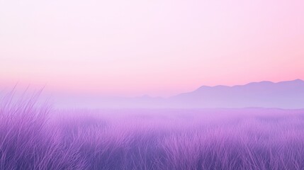 Obraz premium Tranquil Dawn Over Wavy Grass Valley with Soft Pink Hues