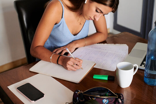 Female student studying at home