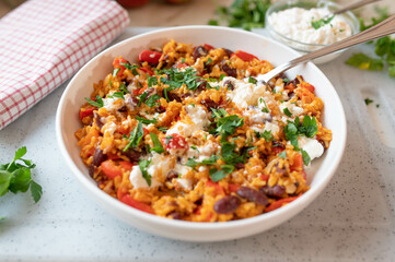 Healthy vegetarian food mit a delicious rice, beans and vegetables. Served with cottage cheese fresh and homemade cooked. 