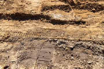 a deep hole in the ground on the site of which a highway was started