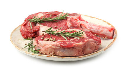 Pieces of raw beef meat and spices isolated on white