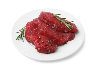 Pieces of raw beef meat and spices isolated on white