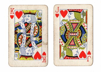 Obraz premium A blackjack or pontoon hand of vintage playing cards on a white background.