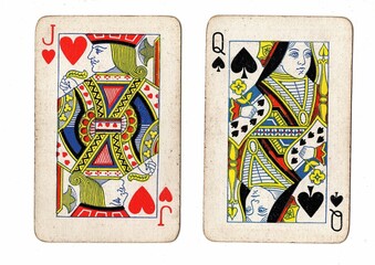 A blackjack or pontoon hand of vintage playing cards on a white background.