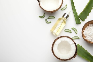 Hair treatment. Cosmetic product, coconut, butter shavings and aloe leaves on white background, flat lay. Space for text