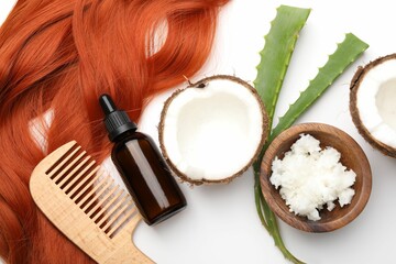 Coconut, butter shavings, hair lock, cosmetic product, comb and aloe leaves on white background, flat lay