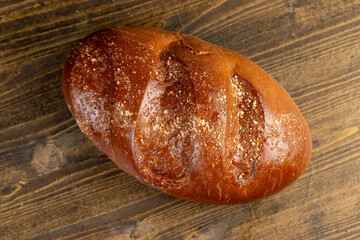 a soft loaf of wheat flour on the table