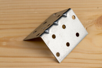 metal corner for connecting wooden parts with screws