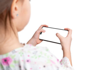 Young girl holds a smartphone horizontally, playing a game or using an app. Over the shoulder view, isolated display and background for mockup.