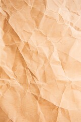 Fototapeta premium Crumpled beige paper with folded texture and wrinkles. Vintage material, old document and antique concept. Abstract background with copy space.