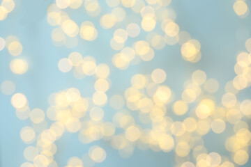 Golden blurred bokeh lights on color background. Glitter sparkle stars for celebrate. Overlay for your design