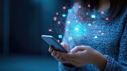 Digital communication technology showing a woman's hand gripping a smartphone, emitting social media symbols