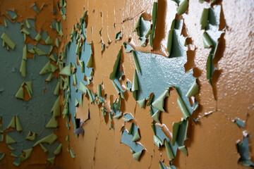 Old, peeling paint in an abandoned house.