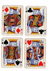 A hand of vintage playing cards showing four of the same value on a white background.