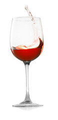 Rose wine splashing in glass on white background