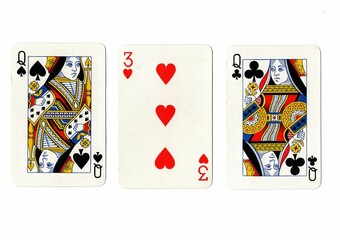 A hand of three playing cards showing a pair of queens on a white background.